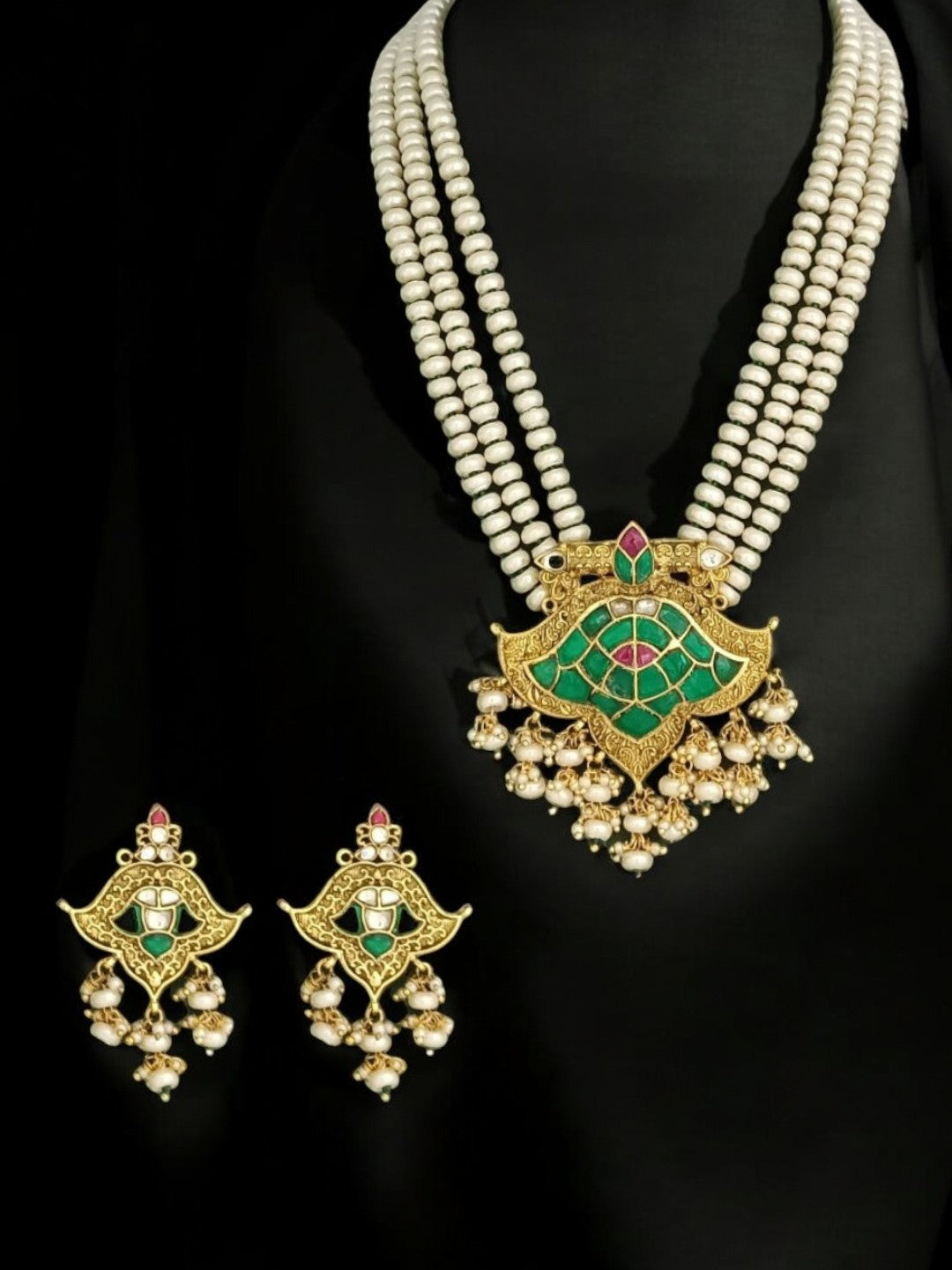 lotus kundan necklace, pearl ethnic jewelry, South Indian bridal set, green and pink kundan, traditional festive necklace, handcrafted Indian jewelry, House of Pranvi, statement kundan pearls, wedding jewelry set, heritage temple jewelry, regal pendant necklace, ethnic pearl choker, antique gold jewelry set, kundan necklace with earrings, festive Indian accessories