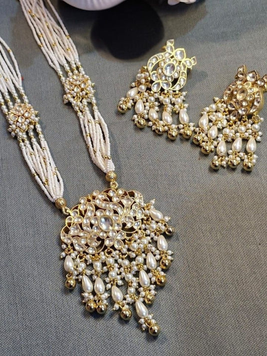 polki pearl jewellery, uncut stone necklace, classic bridal jewellery, ivory pearl set, traditional indian jewellery, handcrafted polki set, house of pranvi jewellery, festive wedding jewellery, kundan pearl jewellery, luxury ethnic necklace