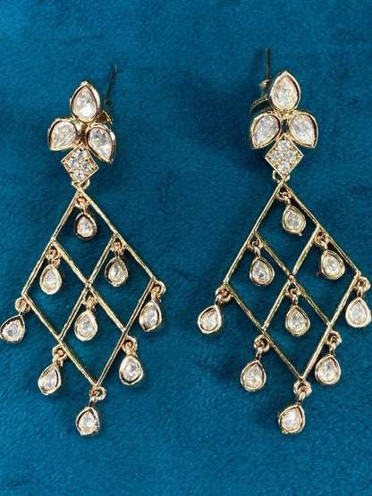diamond drop earrings, geometric jewellary, gold statement earrings, kundan-inspired studs, festive wear earrings, modern ethnic jewellary, chandelier earrings, handcrafted jewellary, pearl-free indian earrings, lightweight bridal accessories