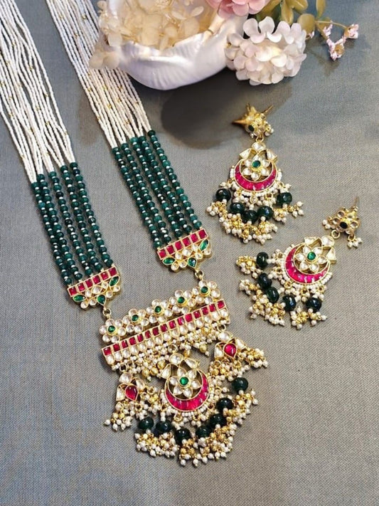 navratna jewellery set, ruby emerald necklace, multicolor kundan jewellery, green beaded necklace, bridal statement jewellery, traditional indian jewellery, house of pranvi collection, handcrafted ethnic set, festive wedding jewellery, bold kundan jewellery