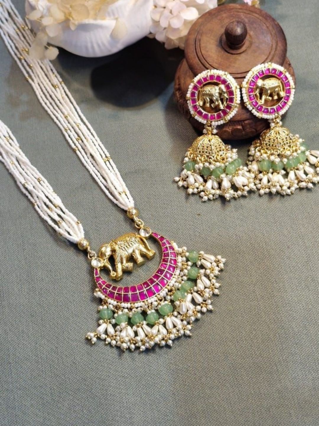 elephant motif jewellery, pink green jewellery set, crescent necklace design, traditional temple jewellery, pearl kundan set, festive ethnic jewellery, handcrafted bridal jewellery, house of pranvi jewellery, royal animal inspired set, statement gold necklace