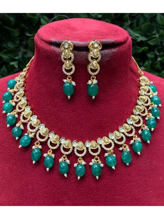 green stone choker, lightweight ethnic jewellery, nature inspired necklace, festive wear accessories, green drop earrings, minimal traditional jewellery, crescent motif necklace, luxury handcrafted set, heritage elegance