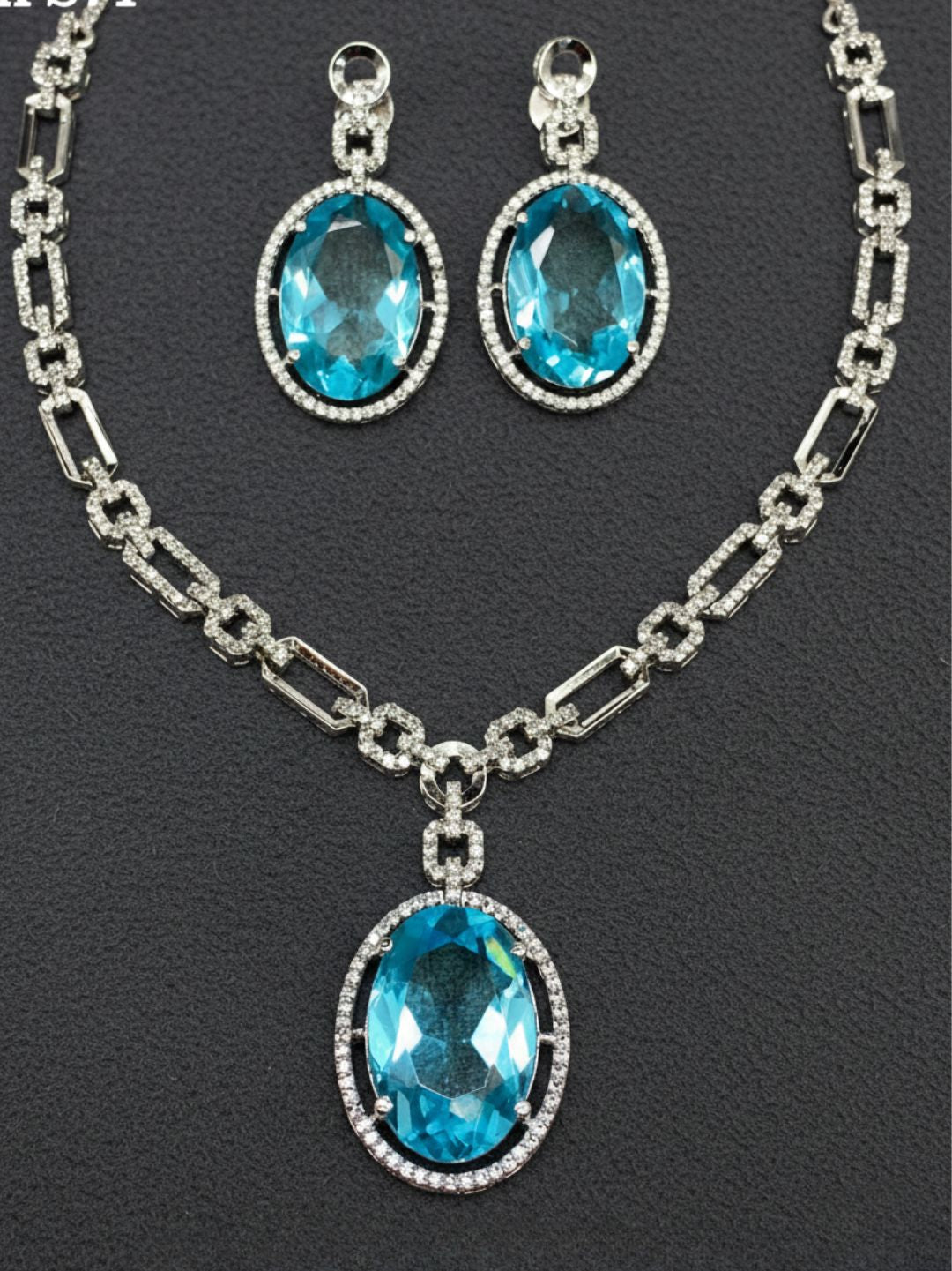 ELARA RUBY OVAL AMERICAN DIAMOND NECKLACE SET