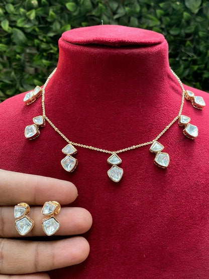 HOUSE OF PRANI ivory double drop moissanite pendant necklace and earrings set with geometric cuts and dainty chain.