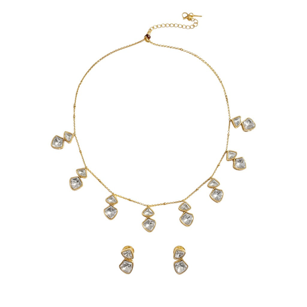 HOUSE OF PRANIV gold-tone necklace and stud earrings set with clear geometric-cut gemstones.